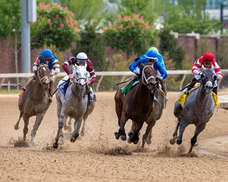 Matareya with Flavien Prat (royal blue cap, center) abaord, turns in the final stretch, winning the 37th running of the Derby City Distaff G1.
