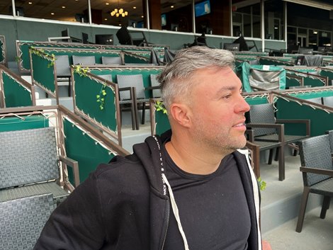 Jon Ebbert of Blue Rose Farm watches Arcangelo train June 6 at Belmont Park