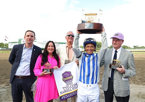 (L to R) Racing Manager Matt Weinman, Owners Dana and Tom Bernhard of Pin Oak Stud, Jockey Mike Smith and Trainer Richard Mandella with the Haskell Trophy after Geaux Rocket Ride won the the $1,000,000 G1 TVG.com Haskell Stakes at Monmouth Park Racetrack in Oceanport, NJ. 7/22/23.  Photo By Bill Denver/EQUI-PHOTO