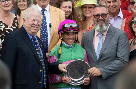 Becky's Joker owner Lee Pokoik, stands in the winner's ring with jockey Javier Castellano after winning the 105th The Schuylerville on opening day at Saratoga Racecourse July 13, 2018. 2023 in Saratoga Springs, NY Skip Dickstein's photo