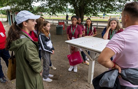 Annise Montplaisir speaks to a group of youngsters in the barn area of the Saratoga Race Course Thursday July 27, 2023 in Saratoga Springs, N.Y. Photo Special to the Times Union by Skip Dickstein