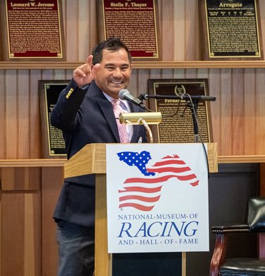 Former jockey Corey Nakatani gives his acceptance speech at the 2023 National Museum of Racing Hall of Fame inductions at the Finney Pavilion on the Fasig Tipton Sales Grounds Friday, Aug. 4, 2023 in Saratoga Springs, N.Y. Photo Special to the Times Union by Skip Dickstein