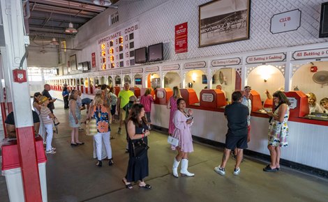 Racing patrons wait patiently for the full power to be restored after a brief power outage caused the cancelation of the 5th race at the Saratoga Race Course Wednesday, Aug. 9, 2023 in Saratoga Springs, N.Y. Photo  by Skip Dickstein