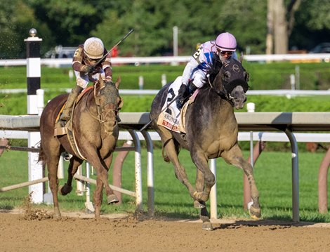 Arcangelo with jockey Javier Castellano,center with pink helmut starts to pull ahead to win the 154th running of The Travers Stakes the Saratoga Race Course Saturday Aug 26, 2023 in Saratoga Springs, N.Y. Photo Special to the Times Union by Skip Dickstein