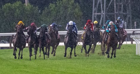 Elusive Princess with jockey Flavian Prat goes wide around the outside left of the field on the way to the win in 5th running of The Fasig-Tipton Saratoga Oaks Invitational at the Saratoga Race Course Friday, Aug. 4, 2023 in Saratoga Springs, N.Y. Photo  by Skip Dickstein