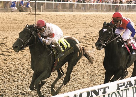 Sarava wins the Belmont Stakes over Medaglia d&#39;Oro on June 8, 2002 at Belmont Park