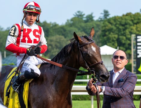 Trainer Chad Brown of Mechanicville is pleased with the outcome of the race as he leads jockey Irad Ortiz Jr.on McKulick they won the 28th running of The Glens Falls at the Saratoga Race Course Thursday, Aug. 3, 2023 in Saratoga Springs, N.Y. Photo  by Skip Dickstein