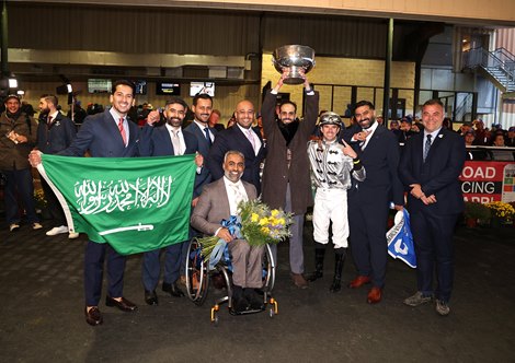 Owner Mohammed Faisel holds up the Pennsylvania Derby Trophy after Saudi Crown #3 with Florent Geroux riding won the $1,000,000 Grade 1 Pennsylvania Derby at Parx Racing in Bensalem, Pennsylvania on September 23, 2023. Photo By Bill Denver /EQUI-PHOTO