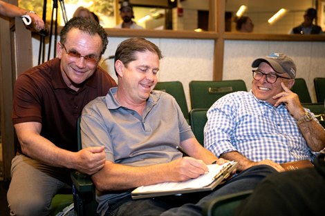 (L-R): John Sikura, Ron Winchell and David Fiske after Hip 145 a yearling colt by Into Mischief out of Guarana, was consigned by Hill &#39;n&#39; Dale at Xalapa to the 2023 Keeneland September Yearling Sale on Sept. 11, 2023 at Keeneland in Lexington, KY.
