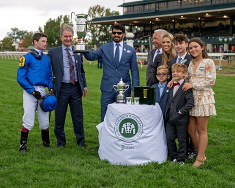 (L-R): Oisin Murphy, Hugh Anderson, Saeed bin Suroor, Mr. and Mrs. Bill (Donna) Shively and family.<br>
Mawj with Oisin Murphy won the Dixiana Queen Elizabeth II Challenge Cup (G1T)  on Oct. 14, 2023.