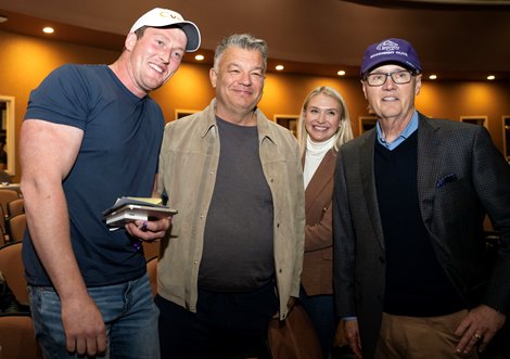 (L-R): Gavin O’Connor, buyer John Stewart with Chelsea Stone, and owner Steve Laymon with Hip 237 Goodnight Olive, consigned by Elite Agent to The November Sale at Fasig-Tipton in Lexington, Ky. on Nov. 7, 2023.