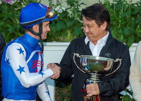 Baoma Corp.&#39;s Charles Chu congratulates Nysos&#39; jockey Flavien Prat after he guided the son of Nyquist to an easy victory in the Grade III $100,000 Bob Hope Stakes Sunday, November 19, 2023 at Del Mar Thoroughbred Club, Del Mar, CA.<br>
Benoit Photo