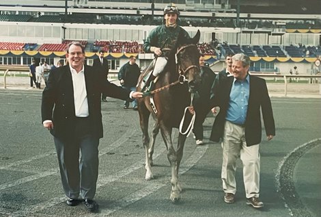 Les Roberts and Tommy O&#39;Keefe walking to the Woodbine winner&#39;s circle with Masada