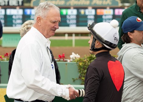 Trainer J. Eric Kruljac, left, celebrates with jockey Hector Berrios, right, after The Chosen Vron's victory in the Grade III, $100,000 San Carlos Stakes, Saturday, March 16, 2024 at Santa Anita Park, Arcadia CA.<br>
© BENOIT PHOTO