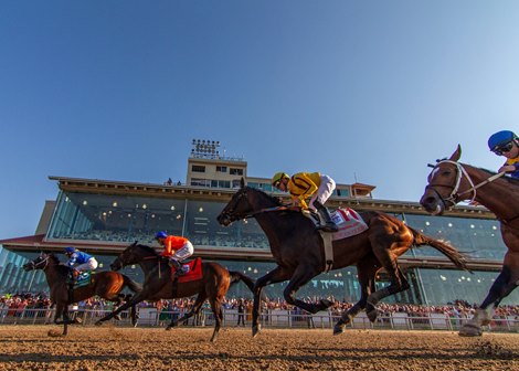 3/23/2024 - Catching Freedom with Flavien Prat aboard pulls away to win the 111th running of the Grade II $1,000,000 Louisiana Derby at Fair Grounds.  Hodges Photography / Amanda Hodges Weir