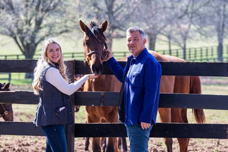 March 13, 2024, Resolute Farm, Midway, KY John Stewart and Resolute Farm Bossy Candy getting treats from Chelsey Stone and John Stewart