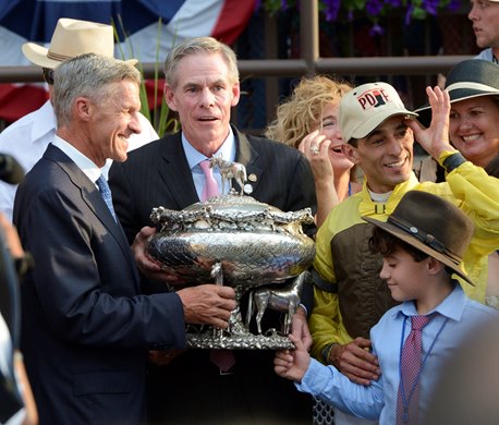 Union Rags's trainer Michael Matz, left and jockey John Velazquez, right receive the winner's trophy from NYRA Board Chairman Steve Dunker after Union Rags won the 144th running of The Belmont Stakes at Belmont Park in Elmont, N.Y. June 9, 2012. Young Michael Velazquez, right holds the trophy as well. (Skip Dickstein Union Rags's trainer Michael Matz, left and jockey John Velazquez, right receive the winner's trophy from NYRA Board Chairman Steve Dunker after Union Rags won the 144th running of The Belmont Stakes at Belmont Park in Elmont, N.Y. June 9, 2012. Young Michael Velazquez, right holds the trophy as well. (Skip Dickstein
