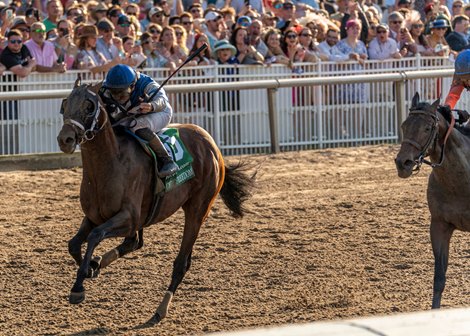 3/23/2024 - Catching Freedom with Flavien Prat aboard pulls away to win the 111th running of the Grade II $1,000,000 Louisiana Derby at Fair Grounds.