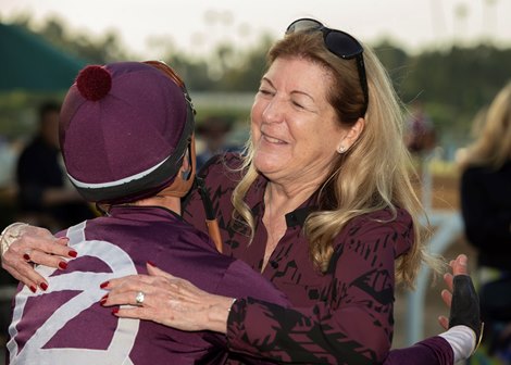 Owner Pamela Ziebarth, right, has a hug for jockey Flavien Prat, left, after Sweet Azteca's victory in the Grade I, $300,000 Beholder Mile, Saturday, March 9, 2024 at Santa Anita Park, Arcadia CA.<br>
© BENOIT PHOTO Owner Pamela Ziebarth, right, has a hug for jockey Flavien Prat, left, after Sweet Azteca's victory in the Grade I, $300,000 Beholder Mile, Saturday, March 9, 2024 at Santa Anita Park, Arcadia CA.<br>
© BENOIT PHOTO