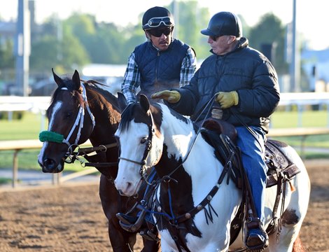 April 25, 2024: D. Wayne Lukas ponying Just Steel back to the barn Thursday morning...