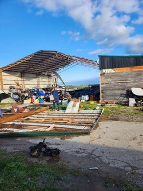 A damaged barn at Hidden Rose Farm