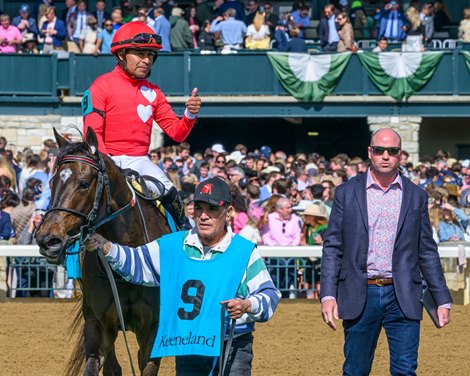 Trainer Phil Bauer walks with Buchu and Martin Garcia into the winners circle for the Appalachian Stakes (G2T) at Keeneland in Lexington, KY  on April 6, 2024