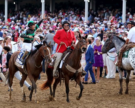 Hernandez waves at the 156,710 crowd after winning the 150th Kentucky Derby with Mystik Dan.<br> Mystik Dan with Brian Hernandez, Jr. wins the Kentucky Derby presented by Woodford Reserve (G1) for trainer Ken McPeek at Churchill Downs in Louisville, Ky on May 4, 2024. Photo by Chad B. Harmon