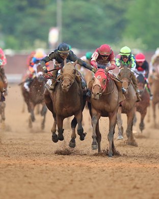 Sierra Leone (outside 2nd) and Forever Young (3rd) battle in the 2024 Kentucky Derby