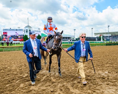 (L-R): Assistant trainer Scott Blasi and co-owner  Clark Brewster walk Cogburn into the winners circle.<br><br />
Cogburn with Irad Ortiz, Jr. wins the Twin Spires Turf Sprint (G2T) at Churchill Downs in Louisville, Ky., on May 4, 2024