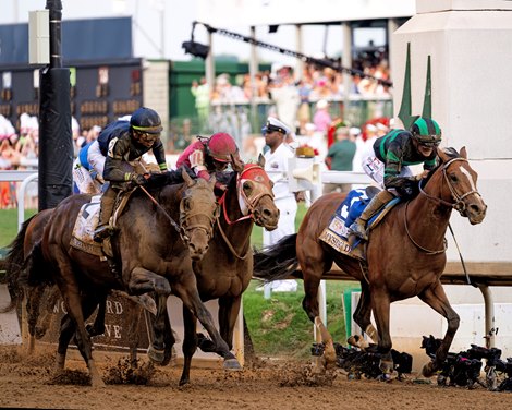 Mystik Dan with Brian Hernandez, Jr. wins the Kentucky Derby presented by Woodford Reserve (G1) for trainer Ken McPeek at Churchill Downs in Louisville, Ky on May 4, 2024. #2 Sierra Leone, outside, lost by a nose in second place, while #11 Forever Young, middle, in third place. Photo by Skip Dickstein