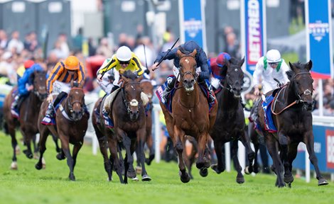 City of Troy (Ryan Moore) wins the Derby<br>
Epsom 1.6.24 Pic: Edward Whitaker