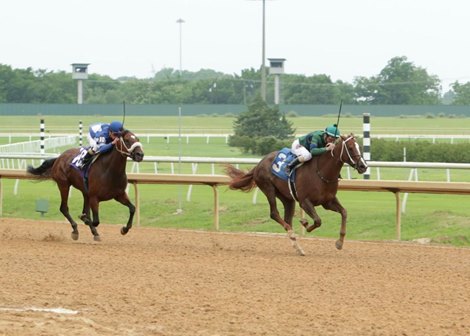 In their first race against each other in April at Lone Star Park, Stewart and Christopher Elliott finished first and second, with Dad (#3) coming out on top. (Dustin Orona Photography)