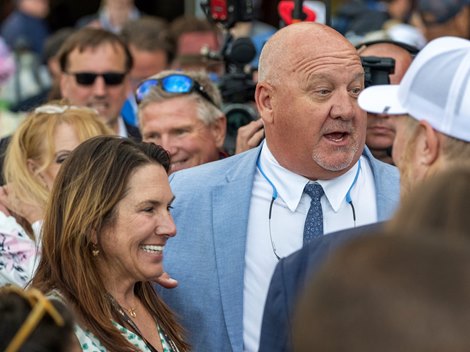 Trainer Kenny McPeek, right is all smiles as he stands with wife Sheri after his trainee Thorpedo Anna  #9 ridden by jockey Brian Hernandez wins the 94th running of The DK Horse Acorn Friday June 7, 2024 at the Saratoga Race Course in Saratoga Springs, N.Y.  Photo  by Skip Dickstein