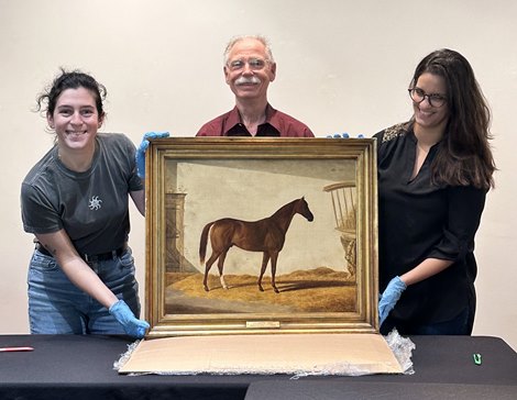 The Lecomte painting arrives at the Alexandria (La.) Museum of Art with (from left) collections manager Maddie Anderson, historian Ron Schneider, and curator Olivia Helsey