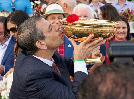 Fierceness owner Mike RepoleK kisses the Man O War winners  trophy after winning the 155th running of these Travers Stakes at the Saratoga Race Course Saturday Aug 24, 2024 in Saratoga Springs, N.Y.  Photo  by Skip Dickstein