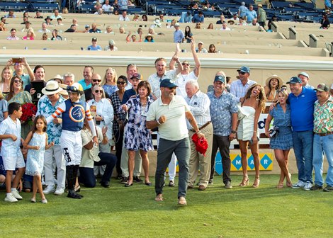 Iscreamuscream and jockey Hector I. Berrios win the Grade I $300,000 Del Mar Oaks presented by Keeneland Sales on Saturday, August 17, 2024 at Del Mar Thoroughbred Club, Del Mar, CA.  Little Red Feather&#39;s Billy Koch, foreground, leads the post-race celebration.<br><br />
Benoit Photo