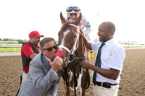 Trainer Kevid Attard with Caitlinhergrtness after the 2024 King's Plate at Woodbine