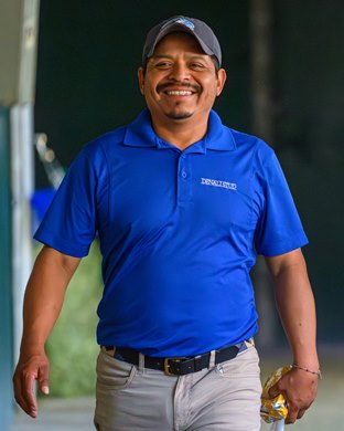 Showman Edras Garcia enjoying a moment in between shows. <br>
Scenes from the Keeneland September sale near Lexington, Ky., on Sept. 18, 2024.