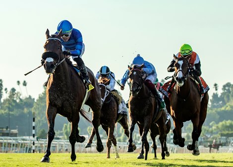 CJ Thoroughbreds' Hang the Moon and jockey Kazushi Kimura, left, win the Grade II $200,000 Rodeo Drive Stakes Saturday, October 5, 2024 at Santa Anita Park, Arcadia, CA. Benoit Photo