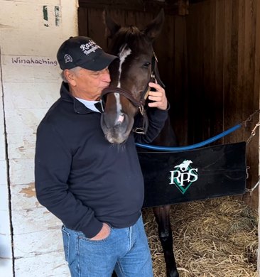 Owner James "Jim" Rashid with Claiming Crown contender Freedom Road at Churchill Downs Owner James "Jim" Rashid with Claiming Crown contender Freedom Road at Churchill Downs
