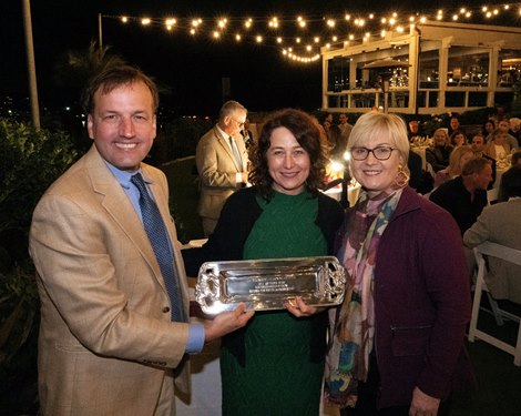 (L-R): National Turf Writers and Broadcasters president Byron King presents the Joe Palmer Award to Sherry Stanley, executive director of the Backside Learning Center, and Caton Bredar, a BLC board member