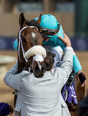 Moira with Flavien Prat wins the Filly &amp; Mare Turf (G1T) at Del Mar Racetrack in Del Mar, CA on November 2, 2024. Trainer Kevin Attard gives a hug to Flavien Prat after the win.