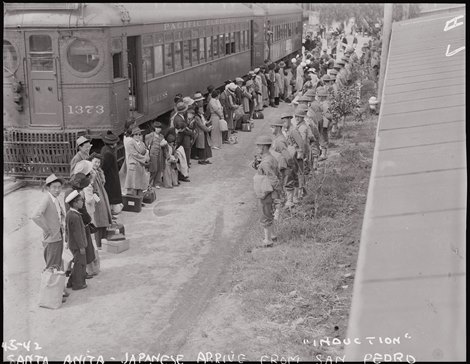 Arcadia, California. Persons of Japanese ancestry arrive at the Santa Anita Assembly center from San Pedro, California. Evacuees lived at this center at the Santa Anita race track before being moved inland to relocation centers