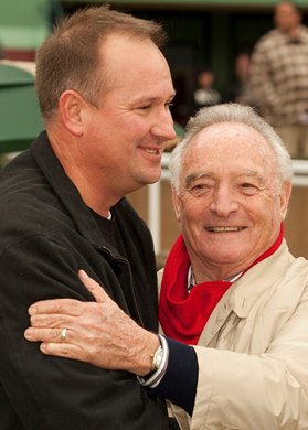 Co-owner Donald Valpredo celebrates with trainer Martin Jones, left, in the winner's circle after Unzip Me's victory in the  Grade III, $100,000 Monrovia Stakes, Sunday, January 2, 2011 at Santa Anita Park, Arcadia CA.<br>
© BENOIT PHOTO