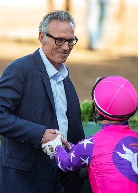 Johannes' trainer Tim Yakteen, left,  and jockey Umberto Rispoli, share a moment after winning  the Grade II $200,000 San Gabriel Stakes Thursday, December 26, 2024 at Santa Anita Park, Arcadia, CA. Benoit Photo