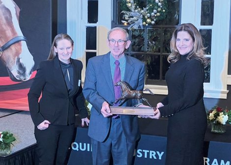 Dr. David Lambert (middle) receives the John W. Galbreath Award from UofL&#39;s Dr. Amy Lawyer (left) and Gwen Davis (right).