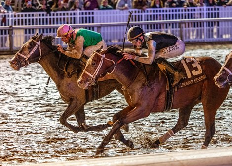  1/18/2025 - Disco Time with jockey Florent Geroux aboard get a head in front of Built to win the 81st running of the Grade III $250,000 Lecomte Stakes at Fair Grounds.  Hodges Photography / Amanda Hodges Weir