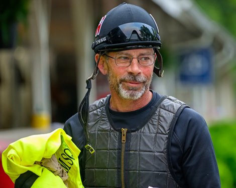 Mark Cutler, exercise rider for Burnham Square (holding his saddle towel) Training and feature shoots at Churchill Downs on April 26, 2025. Mark Cutler, exercise rider for Burnham Square (holding his saddle towel) Training and feature shoots at Churchill Downs on April 26, 2025.