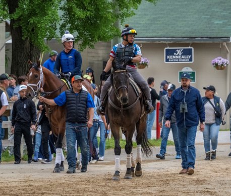 Trainer Mike McCarthy, right walks to with Derby Morning Line Favorite Journalism, left before Saturday’s 151st running of the Kentucky Derby at Churchill Downs Wednesday April. 30, 2025 in Louisville, Kentucky   Photo by Skip Dickstein