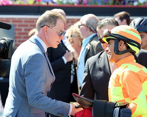 Co-Owner Bobby Flay speaks with Jockey John Velazquez after Crudo won the Sir Barton Stakes at Pimlico on Saturday May 17, 2025.  Photo By Bill Denver/MJC